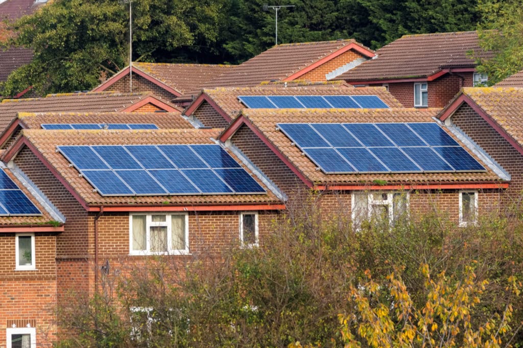 Houses with solar panels on the roof in London UK